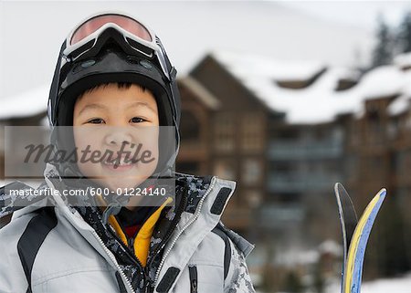 Portrait of Boy with Skis, Whistler, British Columbia, Canada