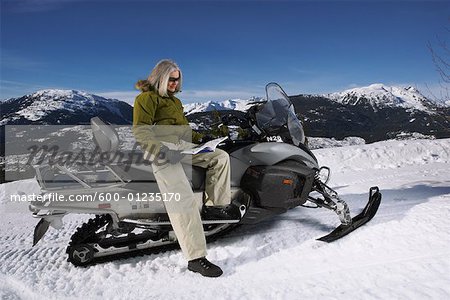 Woman with Snowmobile