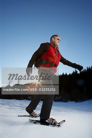 Man Snowshoeing