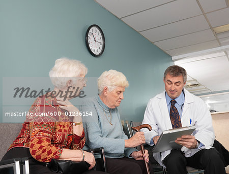 Doctor Speaking With Patients Doctor Speaking With Patients