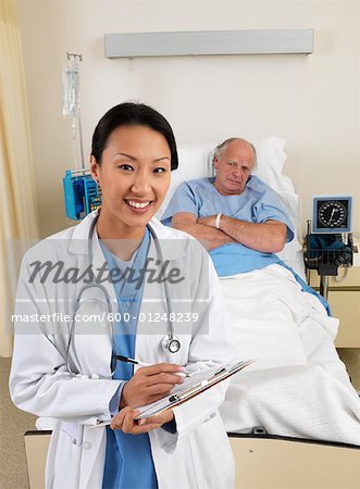 Doctor and Patient in Hospital Room