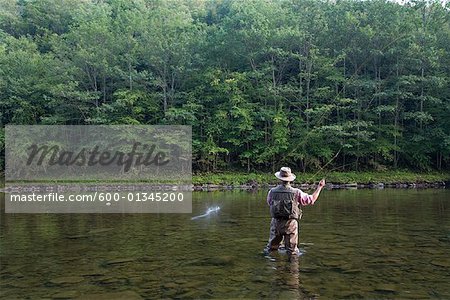 Premium Photo  Gentleman in River Fishing Gear