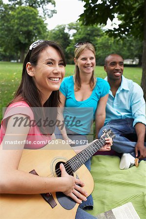 Friends Sitting Outdoors