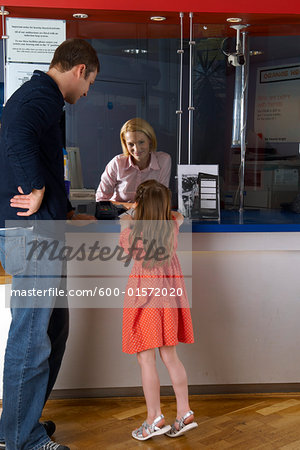 Father with Daughter at Movie Box Office