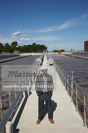 Businessman at Water Treatment Plant