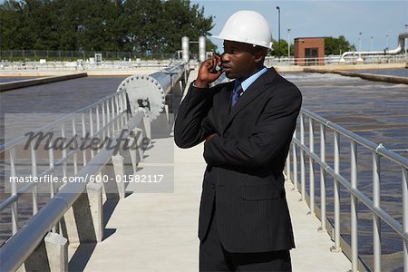 Businessman at Water Treatment Plant