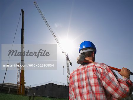 Construction Worker Holding Sledgehammer