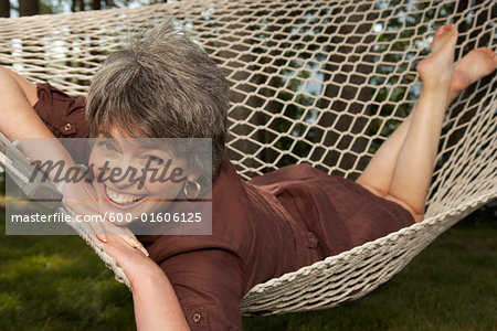 Woman Lying in Hammock