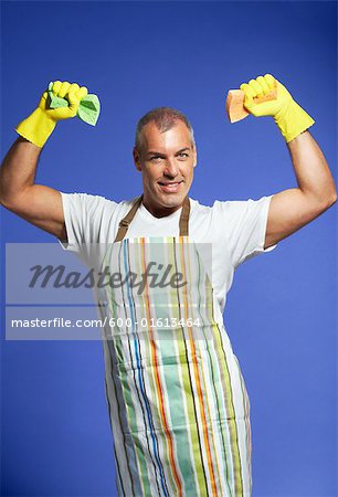 Portrait of Man in Apron, Holding Sponges