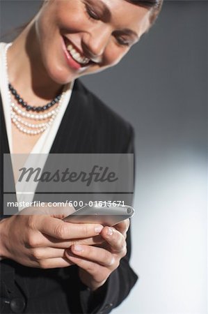 Woman using electronic organizer