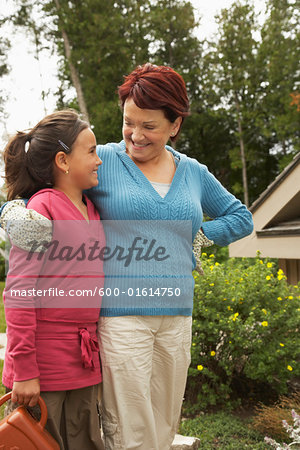 Grandmother and Granddaughter in Garden