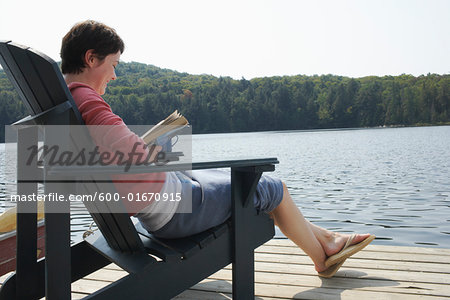 Woman Relaxing on Dock Woman Relaxing on Dock