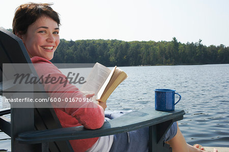 Woman Relaxing on Dock