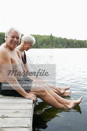 Couple Sitting on Dock