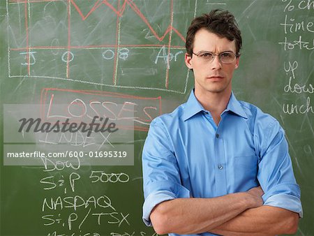 Businessman in Front of Blackboard