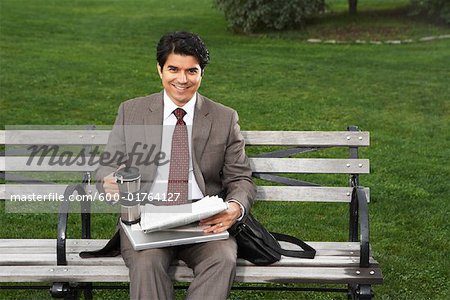 Portrait of Businessman on Park Bench, New York City, New York, USA