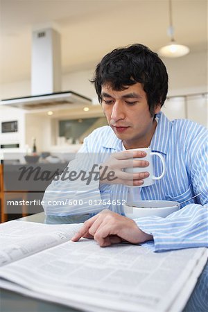Man Drinking Coffee, Reading Newspaper