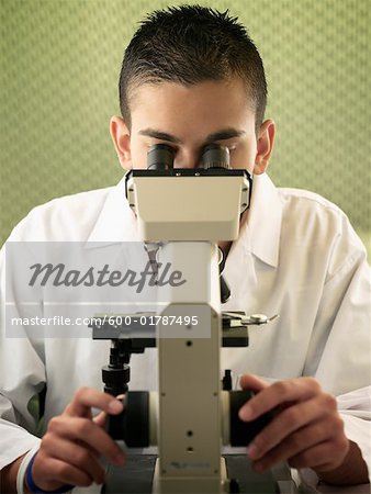 Scientist Using Microscope