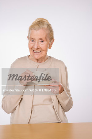 Portrait of Woman Drinking Tea