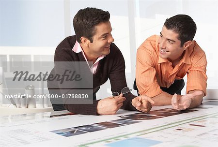 Architects Looking over Blueprint