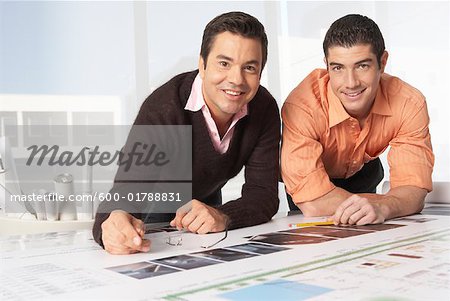 Portrait of Architects with Blueprint