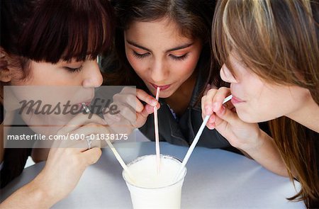 Girls Sharing Milkshake