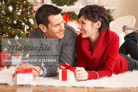 Couple Opening Christmas Presents