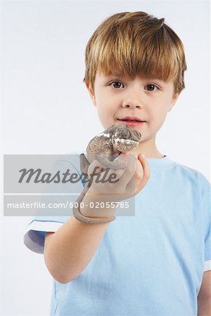 Boy Holding Lizard