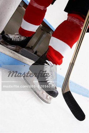 Close-up of Hockey Player's Skates and Stick