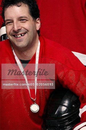 Portrait of Hockey Player Wearing Medal