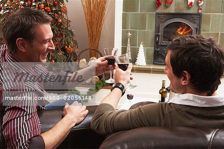 Men Making Toast at Christmas