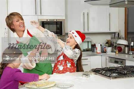 Mother and Daughter Making Christmas Cookies