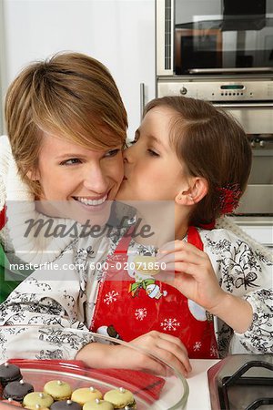 Mother and Daughter Making Christmas Cookies