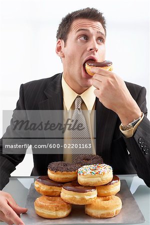 2,800+ Man Eating Donut Stock Photos, Pictures & Royalty-Free