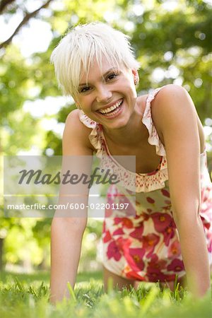 Portrait of Woman on Hands and Knees Outdoors