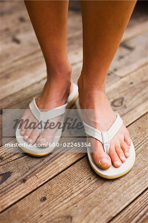 Close-up of Woman Wearing Sandals