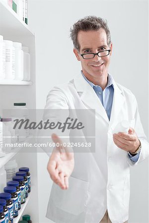 Portrait of Pharmacist Offering Hand for Handshake