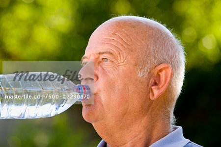 Man Drinking Bottled Water