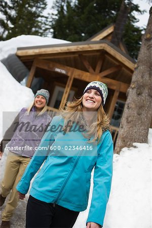 Woman Walking By Cabin Government Camp Oregon Usa Stock Photo