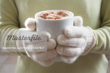 Close-up of Woman Holding Mug of Hot Chocolate