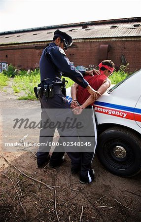 Police Officer Arresting Suspect