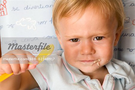 Portrait of Little Boy Eating
