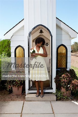 Woman Waiting in Front of Church, Niagara Falls, Canada