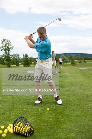 Man at Driving Range, Burlington, Ontario, Canada