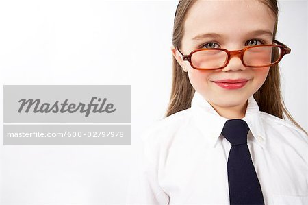 Girl Looking over Glasses