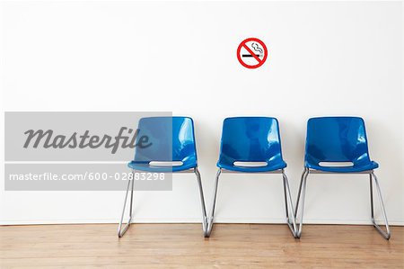 Row of Blue Chairs in Waiting Room