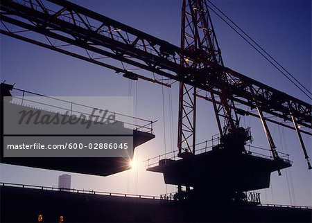 Freeway Bridge Construction, Cranes, Silhouette