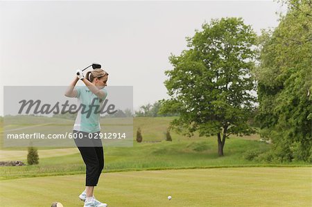 Woman Playing Golf