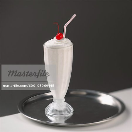 https://image1.masterfile.com/getImage/600-03069445em-vanilla-milkshake-stock-photo.jpg