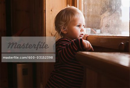 Portrait of Girl Looking out of Window